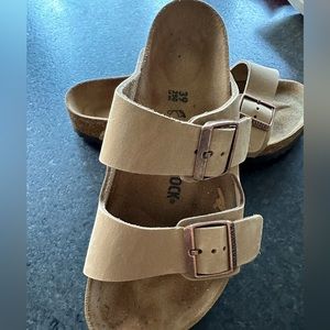 New Birkenstock Sandals; tan with rose gold buckles.  Only worn once.
